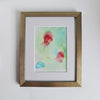 "Chloris One, 2018" abstract alcohol ink artwork mounted in a white frame, showcasing vibrant colors and fluid design.