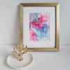 "Aphrodite Plays, 2018" abstract alcohol ink painting featuring vibrant pink, purple, and blue tones with fluid swirls and intricate patterns.