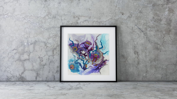 Abstract floral watercolor painting in shades of purple and blue framed against a textured concrete wall.