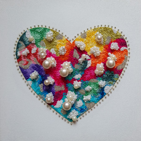 Hand stitched heart artwork on square canvas. Embroidery thread, metallic thread, seed beads, faux pearls on canvas.  Gorgeous Rainbow Heart created to bring you oodles of colour and joy!  