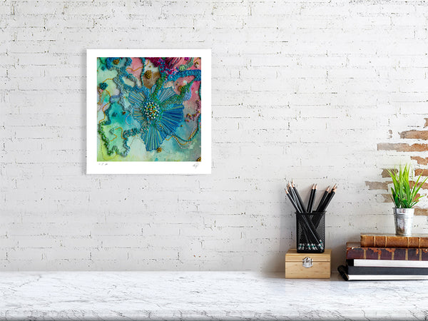 Framed Viola Five 2022 fine art print showing detailed abstract embroidery in vibrant blues and pinks on white wall.