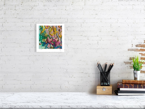 Framed Viola Five 2022 Giclée fine art print showing colorful abstract fiber embroidery detail on white wall.