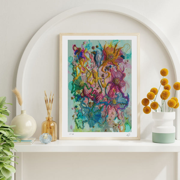 Framed Viola Five 2022 Giclée fine art print with vibrant abstract floral textures on white shelf decor.
