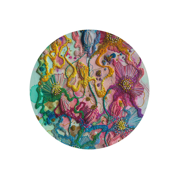 Circular embroidery art print featuring vibrant threads and beads in a minimalist modern composition on white background