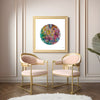 Framed Viola Five 2022 Mojo Worlds giclée print with vibrant embroidery detail in elegant modern room.