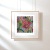 Framed Giclée fine art print showing vibrant embroidered abstract floral textile detail in pink, green, and yellow tones.