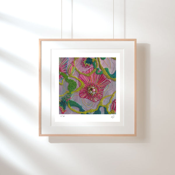 Framed Giclée fine art print showing vibrant embroidered abstract floral textile detail in pink, green, and yellow tones.