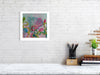 Framed Viola Four 2022 Details II print showing colorful abstract embroidery textural art on white wall.