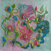 Abstract floral embroidery with vibrant threads and beads in pink, blue, and green on a soft pastel background