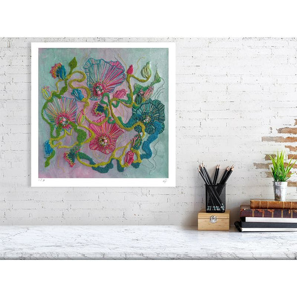 Viola Four 2022 Giclée fine art print with abstract floral design, displayed on white brick wall above desk.