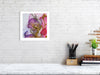 Framed Viola Odorata 2020 fine art print showing detailed embroidery with vibrant threads and textures on a white wall.