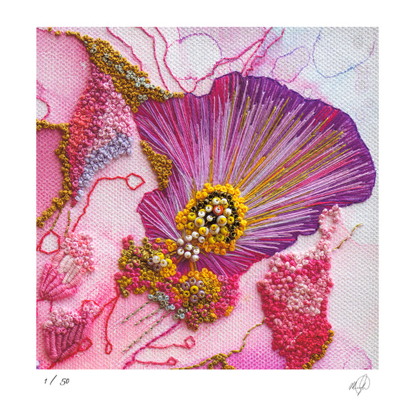 Close-up of Viola Odorata embroidery detail with intricate stitches in purples, pinks, and yellow on textured fabric.