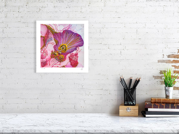 Framed Viola Odorata 2020 Giclée fine art print showing vibrant hand-stitched embroidery details on white wall.