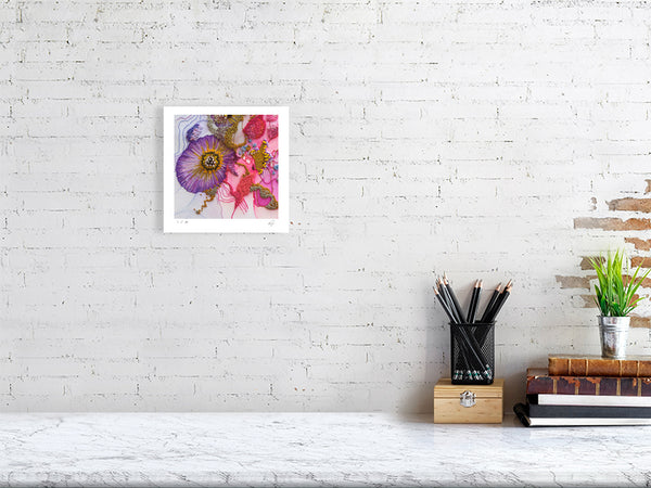Framed Viola Odorata 2020 fine art print showing intricate purple and pink embroidered floral details on white brick wall.