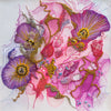 Abstract floral embroidery in vibrant purples, pinks, and golds with intricate texture on white fabric background.