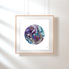 Framed Viola Seven embroidery print with purple, blue, and gold threadwork in a modern minimalist circular design.