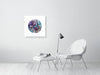 Minimalist living room with white chair and wall-mounted Viola Seven 2023 Mojo Worlds Giclée fine art print.