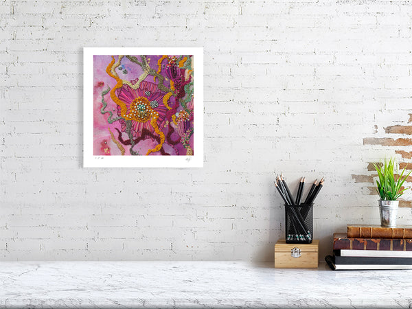 Framed Viola Six 2022 Giclée fine art print with intricate colorful embroidery details on white wall above desk.