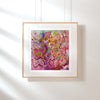Framed Viola Six 2022 abstract fine art print with vibrant colors and textured botanical elements on white wall.