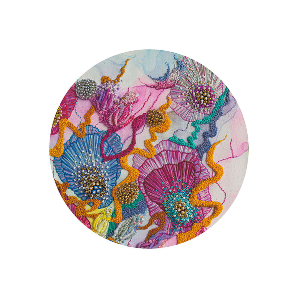 Circular fine art print featuring vibrant hand-stitched embroidery with beads and vivid colors on white background.