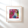 Framed Viola Two 2021 Giclée fine art print showing detailed embroidery patterns in vibrant colors on white wall.