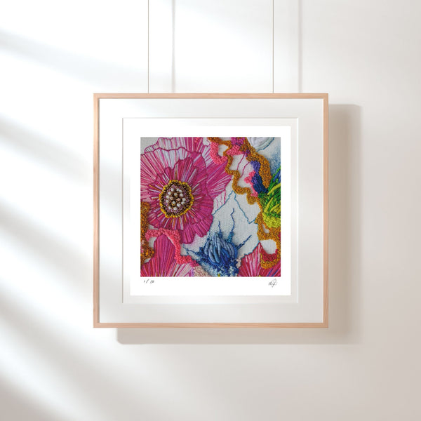 Framed Viola Two 2021 Giclée fine art print showing detailed embroidery patterns in vibrant colors on white wall.