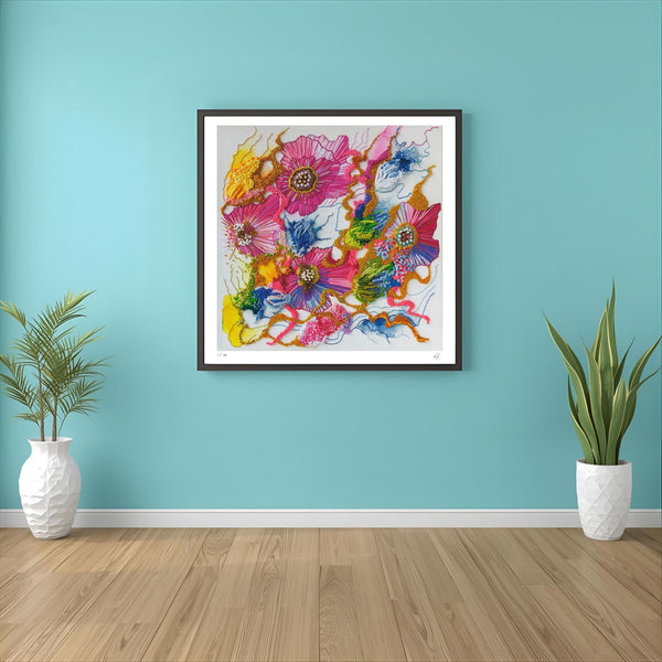 Framed Viola Two 2021 Giclée fine art print with vibrant abstract florals on light blue wall between white planters.