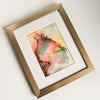 Abstract alcohol ink painting on Yupo paper depicting Ares, Greek god of war, mounted in white with gold frame excluded
