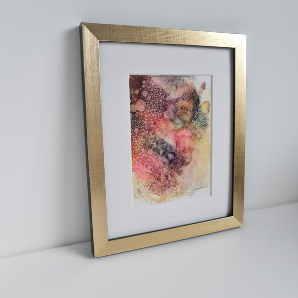 Abstract alcohol ink artwork titled Ares Two depicting Greek god of war, mounted and ready for framing.