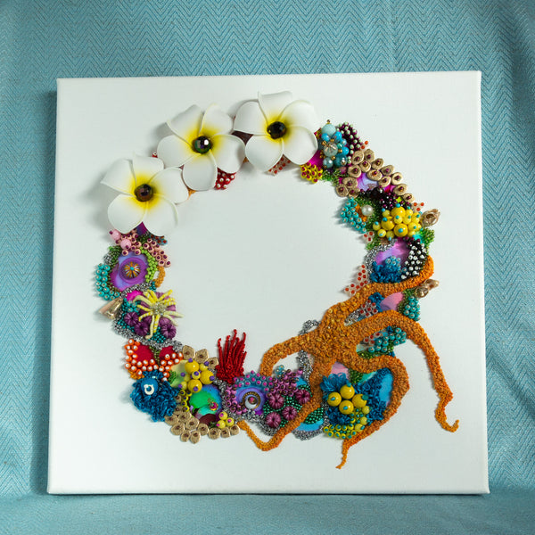 Abstract coral reef wreath with mixed media beads, embroidery, faux flowers, and gold metallic thread on white canvas.
