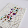 Handcrafted canvas artwork featuring upcycled beads, sequins, and embroidery in vibrant colors, 25x20cm size.