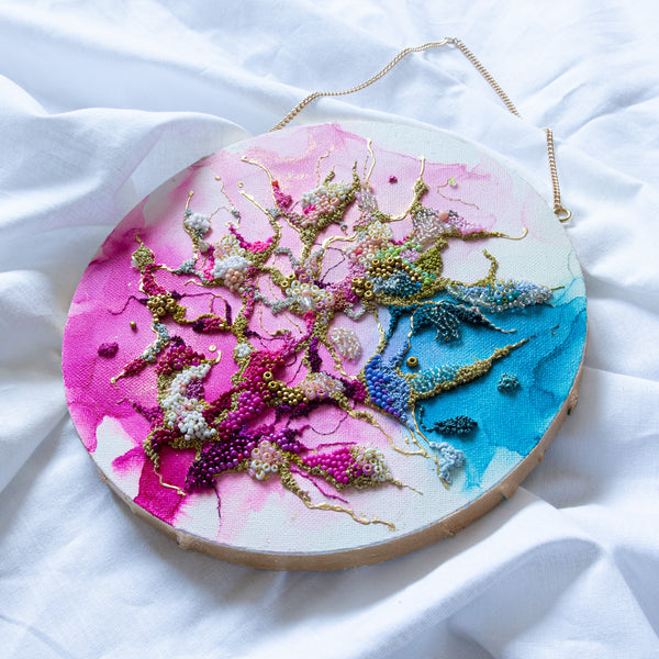 Hand-embroidered and alcohol ink art with seed beads and gold threads on canvas, gold leaf edging, 20cm diameter.