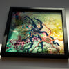 Framed resin artwork featuring embroidered and beaded starfish inspired by tide pools in vibrant colors.