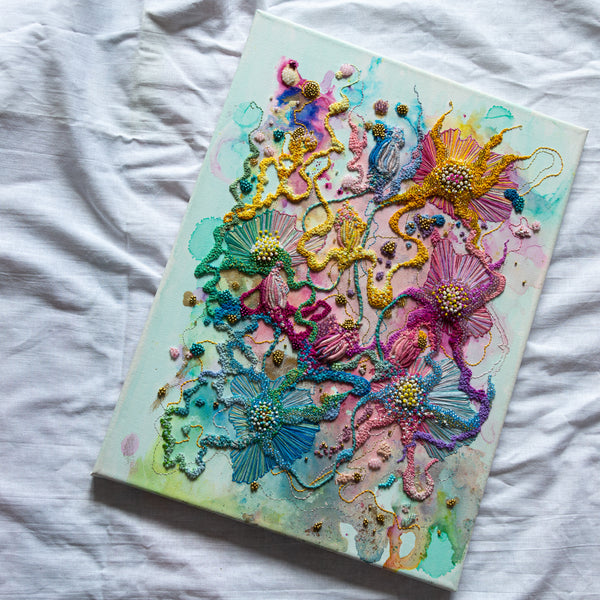 Colorful abstract floral embroidery with alcohol ink, seed beads, gold thread on canvas, 30x40cm artwork titled Viola Five 2022.