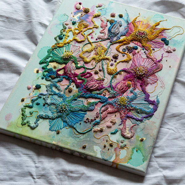 Abstract floral embroidery with alcohol ink, seed beads, gold thread on canvas, vibrant textured colors, 30x40cm artwork.