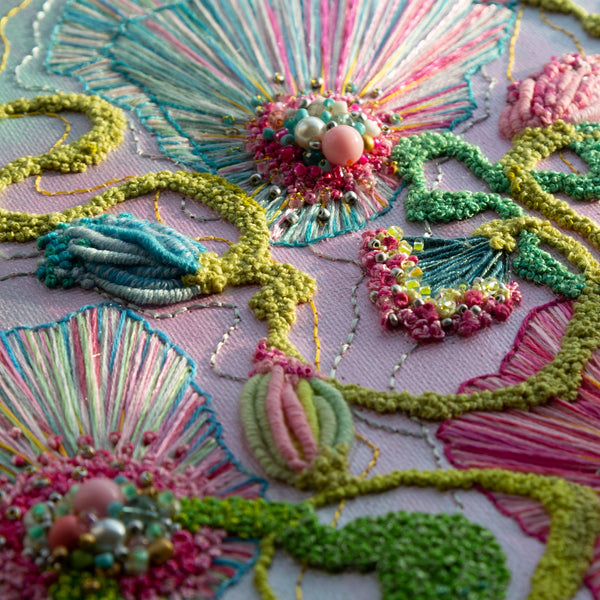 Close-up of Viola Four 2022 embroidered floral artwork with beads, metallic paint, and textured threads on canvas