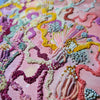 Close-up of Viola Six 2022 abstract embroidery with colorful threads, seed beads, and metallic accents on pink canvas.