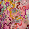 Close-up of Viola Six artwork featuring colorful alcohol ink, intricate embroidery, seed beads, and metallic threads on canvas.