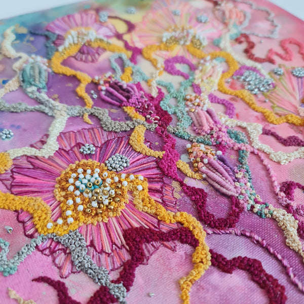 Close-up of Viola Six 2022 artwork featuring alcohol ink, hand embroidery, beads, and metallic threads on canvas