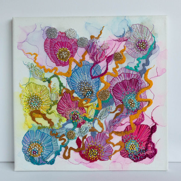 Abstract floral artwork with embroidery floss, seed beads, gold thread, and alcohol ink on 30cm square canvas.