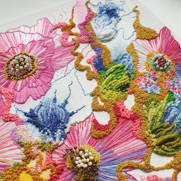Close-up of Viola Two 2021 artwork featuring intricate alcohol ink painting and hand embroidery with yarn, threads, and beads on canvas.