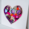 Colorful embroidered heart artwork with beads and metallic thread on canvas, part of the 2021 Heart Series.